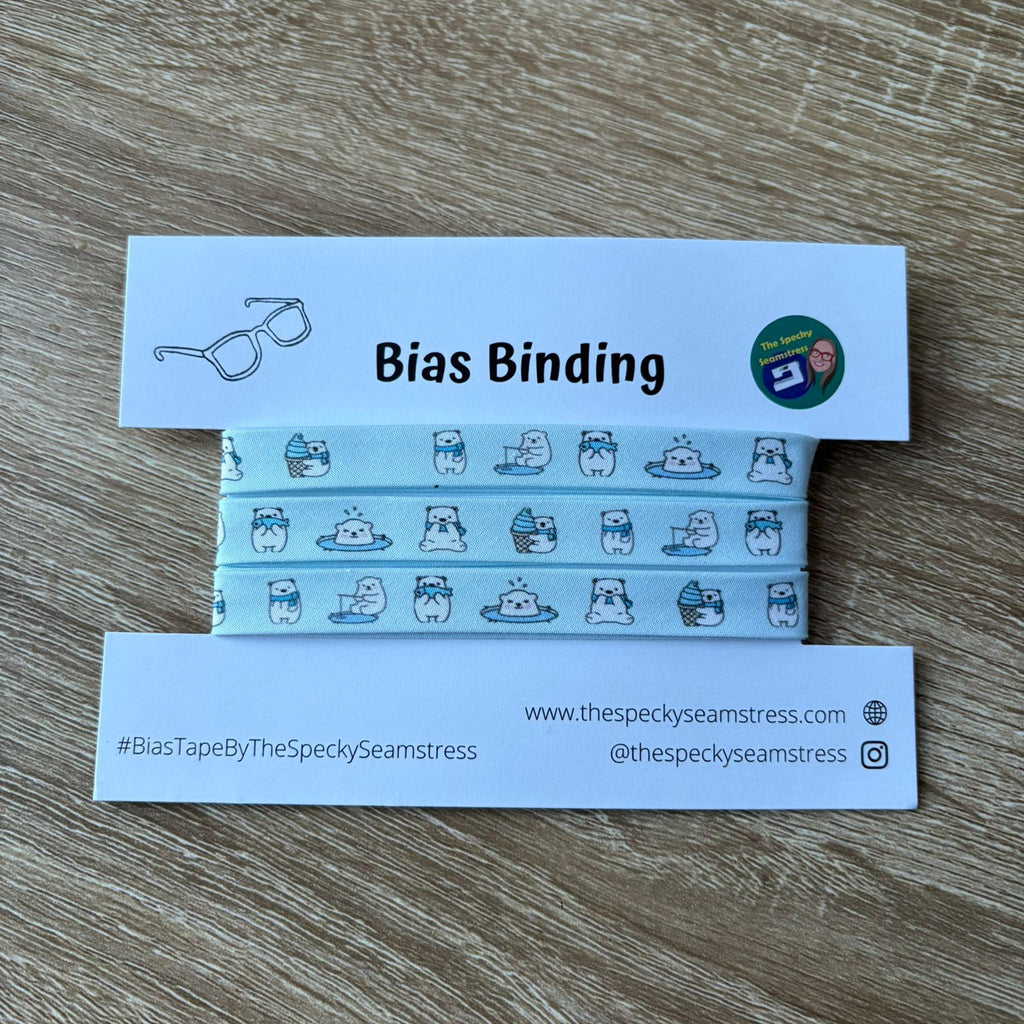 Bias binding strips with packaging on a wooden surface